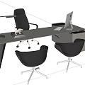 Modern Office Desk Setup with Computer Monitor Keyboard Desk Lamp Books and Comfortable Chairs
