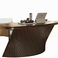 Modern Dark Curved Desk In Study Room With Wooden Bookshelf Books Decorations And Potted Plant
