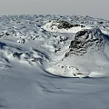 Vast Snow Covered Scenic Landscape With Stretching Road And Distant Rocks