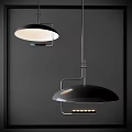 Modern Black Pendant Lights With Metallic Frame And Circular Shade Hanging In Interior