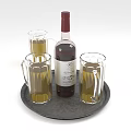 Stylish Wine Bottle and Glass Mugs on Black Tray with Yellow Liquid
