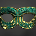 Ancient Bronze Mask With Green And Gold Intricate Decorative Patterns