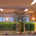 Hotel Public Lounge Area Featuring Living Plant Wall Large Windows And Modern Pendant Lights