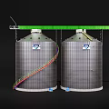 Two Silver Cylindrical Industrial Storage Tanks With Green Overhead Beam Mesh Structure And Colored Pipes