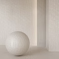 Light Colored Design Components Featuring Sphere With Textured Walls And Floor In Minimalist Modern Style