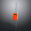 Orange Rectangular Device With Display Screen On Vertical Silver Metal Pole