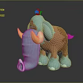 Cartoon Elephant Sculpture with Blue and Brown Colors Yellow Horns and Little Bird on Head