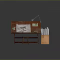 Wooden Drawing Desk And Stool With Blueprints Table Lamp Scrolls And Cardboard Box