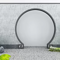 Circular Archway with Gray Wall Gravel Ground Stones and Green Plants