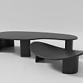 Modern Black Coffee Tables With Curved Irregular Tops And Textured Cylindrical Legs