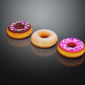 Three Colorful Donuts With Pink Frosting Purple Sprinkles And Original Flavor On Black Surface