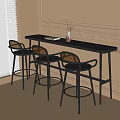 Modern Rattan Back Bar Stools By Black Counter With Light Wall And Natural Light