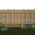 Decorative Garden Ornament Featuring Bamboo Fence Green Grass Rocks and Plants