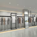 Modern Clothing Store Interior With Black Metal Racks Hanging Apparel Light Walls And Mirrors