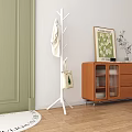 Wooden Coat Rack Hanging Coat Canvas Bag With Wooden Cabinet Green Door And Wooden Floor
