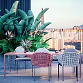 Outdoor Table with Red and White Rattan Chairs Green Plants and City View Balcony