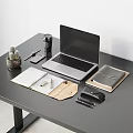 Open Laptop on Black Desk with Coffee Cup Cactus Plant Open Notebooks and Office Supplies