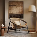 Wicker Armchair With Floor Lamp And Woven Wall Art In Cozy Living Space