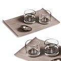 Transparent Glass Cups Placed On Wooden Tray With Small Metal Dish
