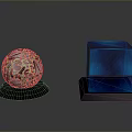Silver Sphere with Intricate Patterns and Blue Cubes on Black Base with Reflections