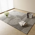 Black and White Geometric Pattern Square Rug on Wooden Floor with Vase Flowers and Magazines