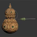Golden Gourd Shaped Sculpture Featuring Intricate Patterns Green Gemstones And Decorative Details