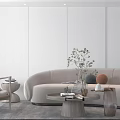Modern Curved Sofa and Round Coffee Table Set with Green Plants Decorative Vases and Books
