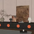 Dark Wood TV Stand With Orange Circular Accents And Vase Lamp Artwork Against Beige Wall