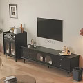 Black TV Stand Featuring Drawers And Glass Doors With TV Tall Cabinet And Decorative Items