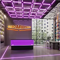 Skateboarding Store Interior With Purple Neon Lights Display Shelves And Reception Counter