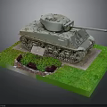 Military Tank Model Displayed on Green Base With Small Plants and Plaque