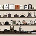 Elegant Tea Ware Collection On Wooden Shelves Featuring Ceramic Teapots And Tea Packages