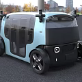 Light Blue Modern Urban Car With Large Windows And Black Accents