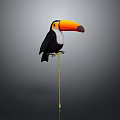 Toucan with Large Colorful Beak Perched on Golden Stand Against Grey Background