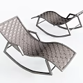 Two Modern Outdoor Lounge Chairs With Metal Frame And Woven Design