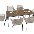 Elegant Outdoor Table with Six Rattan Chairs and Fresh Fruit on Tabletop
