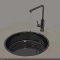 Round Kitchen Sink with Black Faucet on Gray Countertop and Running Water