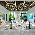 Modern Break Room Interior Design With White Tables Chairs Large Windows And Green Plants