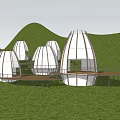 Egg Shaped White Buildings In Tropical Forest With Palm Trees Lush Greenery Wooden Frames Walkways