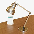 Stylish Wooden Arm Desk Lamp With Black Shade On Brown Table And Calendar