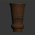 Intricately Carved Brown Clay Vase Sculpture With Decorative Patterns