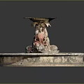 Classical Stone Fountain With Circular Base And Ornate Carved Pillar Topped With Shallow Basin