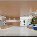 Hotel Front Desk with Wooden Counter White Wall Pendant Lights Green Plants and Blue Sofas