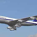 Lufthansa Passenger Plane Flying In Blue Sky With White And Blue Livery