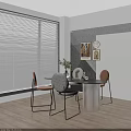 Modern Dining Table Set with Colored Chairs Near Window Decorative Art Wall Clock Green Plant