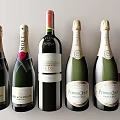 Luxury Wine Bottles and Glass Featuring Moët Chandon Perrier Jouët Champagne and Red Wine