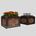Roadside Planters With Wooden Structure And Metal Decorative Frames Holding Orange Purple Flowers