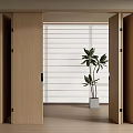 Modern Wooden Folding Doors Open to Reveal Bright Space With Window and Potted Plant