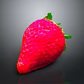 Fresh Ripe Red Strawberry with Green Leaves on Dark Surface
