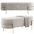 Modern Beige Upholstered Sofa Bench With Golden Metal Legs And Soft Throw Blanket